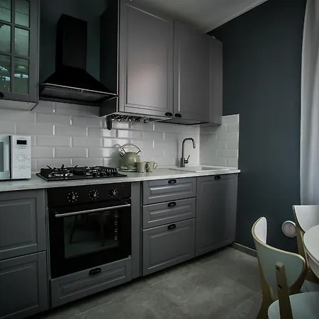 In The Center Апартаменты *